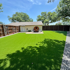 Full-Backyard-Artificial-Turf-Installation-with-Landscape-Rock-Border-in-Garland-TX 10